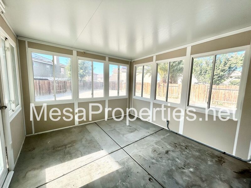 Beautiful 4 Bed 3 Bath Home with a Sunroom and Solar Panels in Victorville! property image