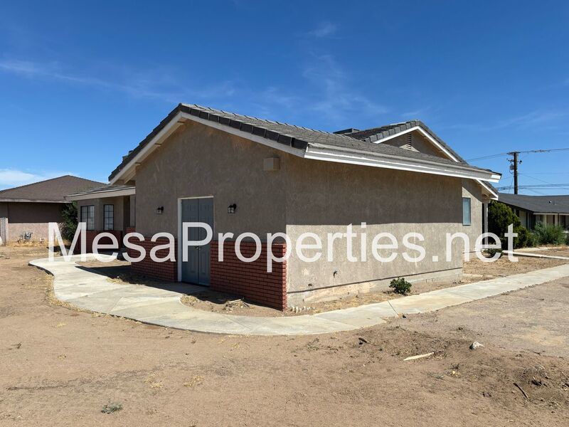 Welcome to this spacious and well-maintained 3 bedroom, 2-bathroom home with a bonus room! property image