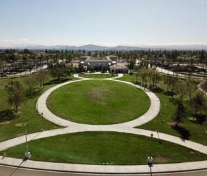 Overhead view of Central Park with view of mountains and city in the background